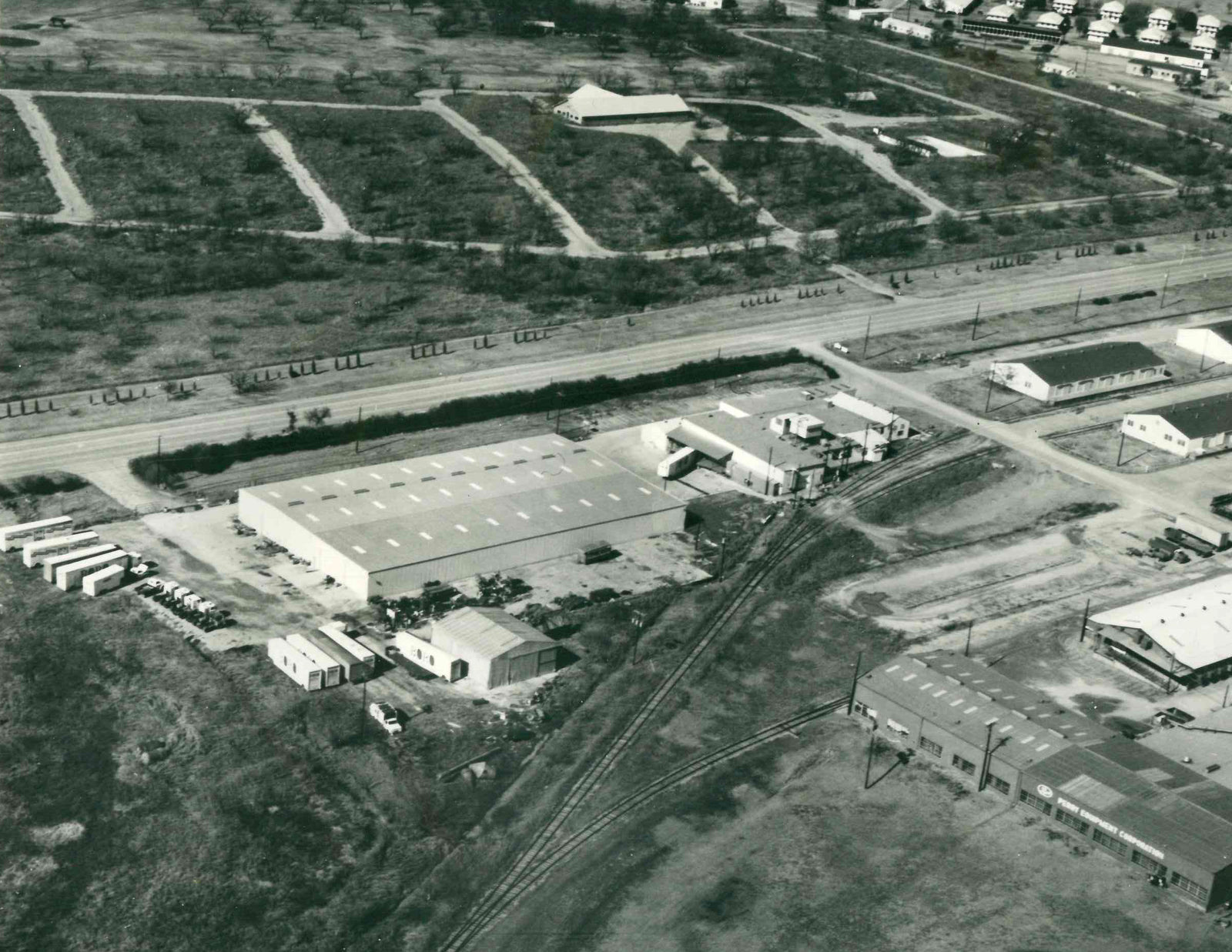 Black and white aerial view of the Ventamatic facility in the 1970's. Ventamatic is the manufacturer behind the Maxx Air brand name.