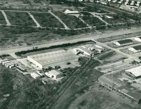 Black and white aerial view of the Ventamatic facility in the 1970's. Ventamatic is the manufacturer behind the Maxx Air brand name.
