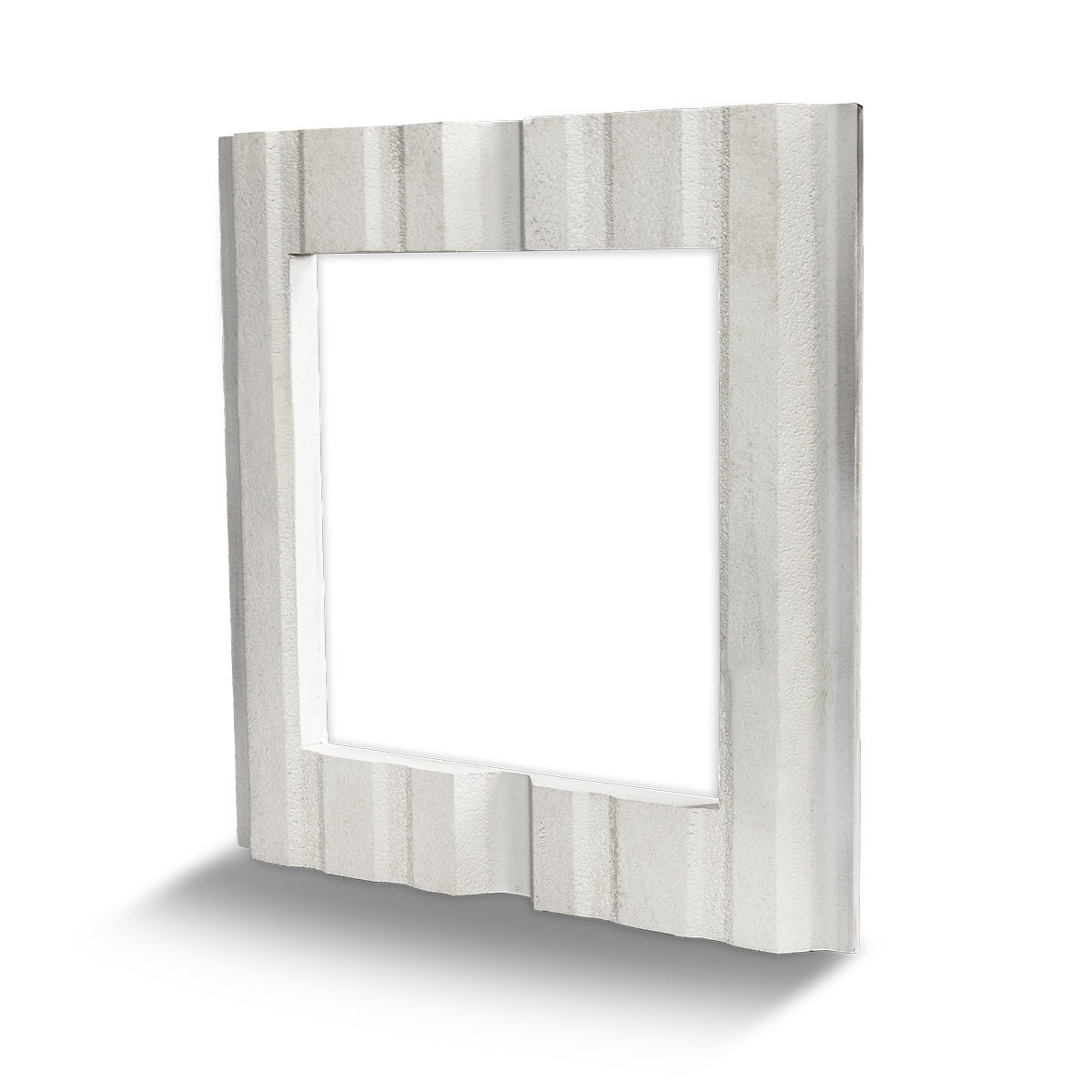 Angled back view of the metal wall adapter showing the R-panel pattern molded onto the EPS.