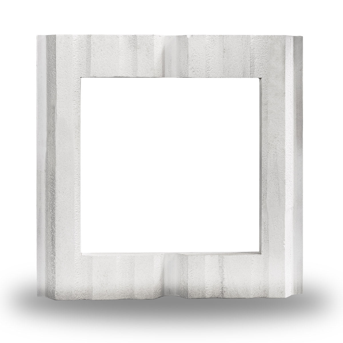 Back view of the metal wall adapter showing the R-panel pattern.