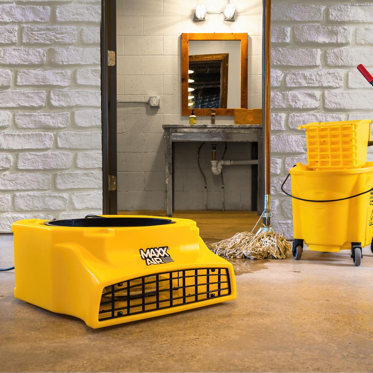 The HVCF1600's low profile design dries floors quickly and efficiently in commercial bathrooms.