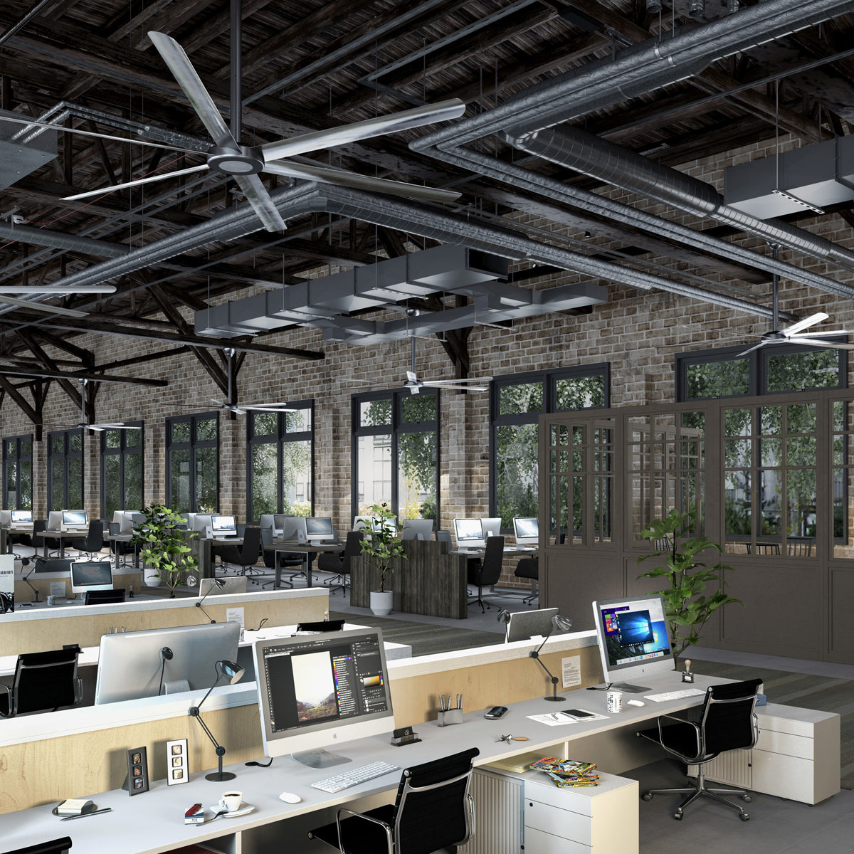The HVLS 108 provides massive air circulation in a large commercial office.