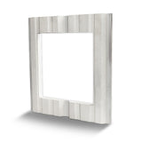 Angled back view of the metal wall adapter showing the R-panel pattern molded onto the EPS. 