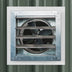 Mockup of an IF14R installed on an R-panel corrugate wall using the adapter frame as a base. 