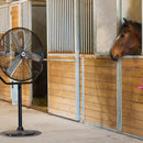 The HVPF 30 YOKE stand fan cools a horse stall-side in a barn.